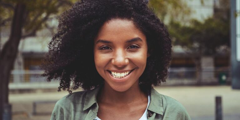 woman smiling while in the recovery ecosystem