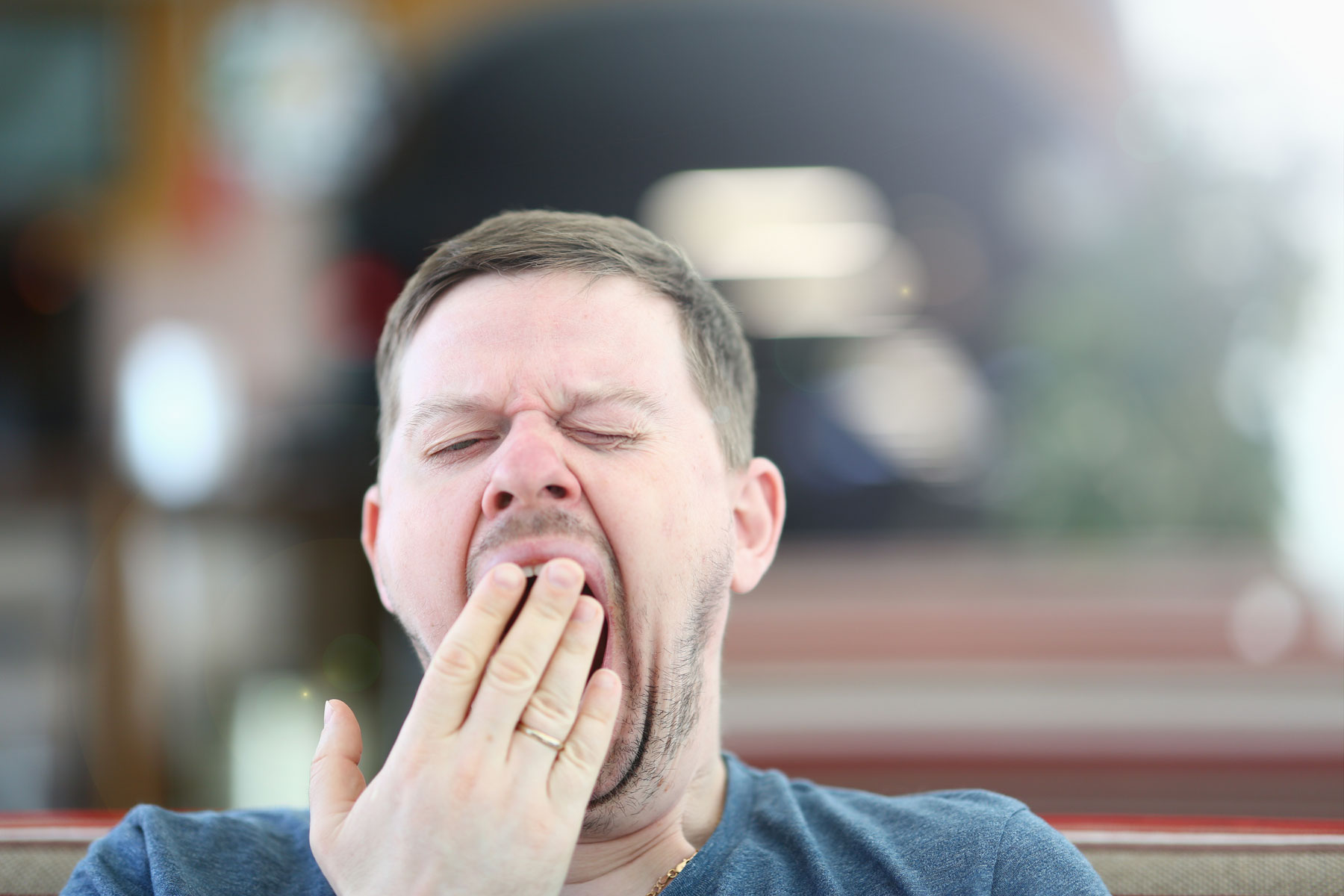person yawning while experiencing fatigue as one of many common vivitrol side effects