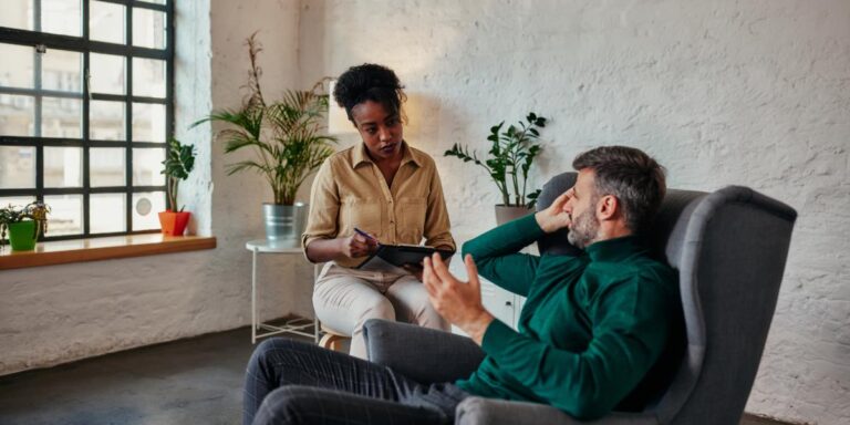 person in counseling learning the benefits of mat for alcohol dependence