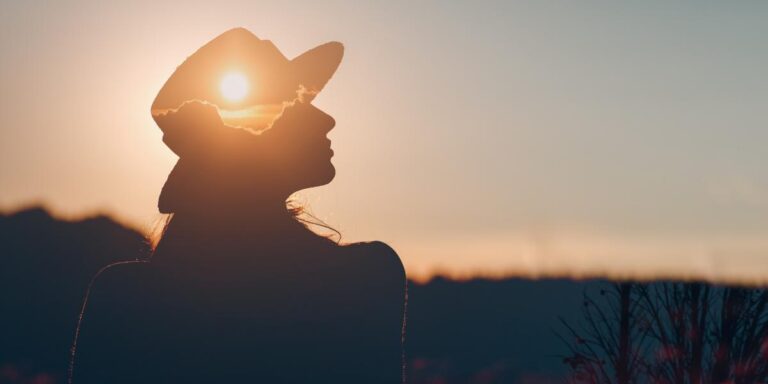 person watching sunset while considering tips to avoid relapse after treatment